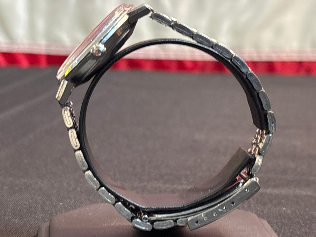 Omega Seamaster Deville date SS case on beads of rice bracelet.