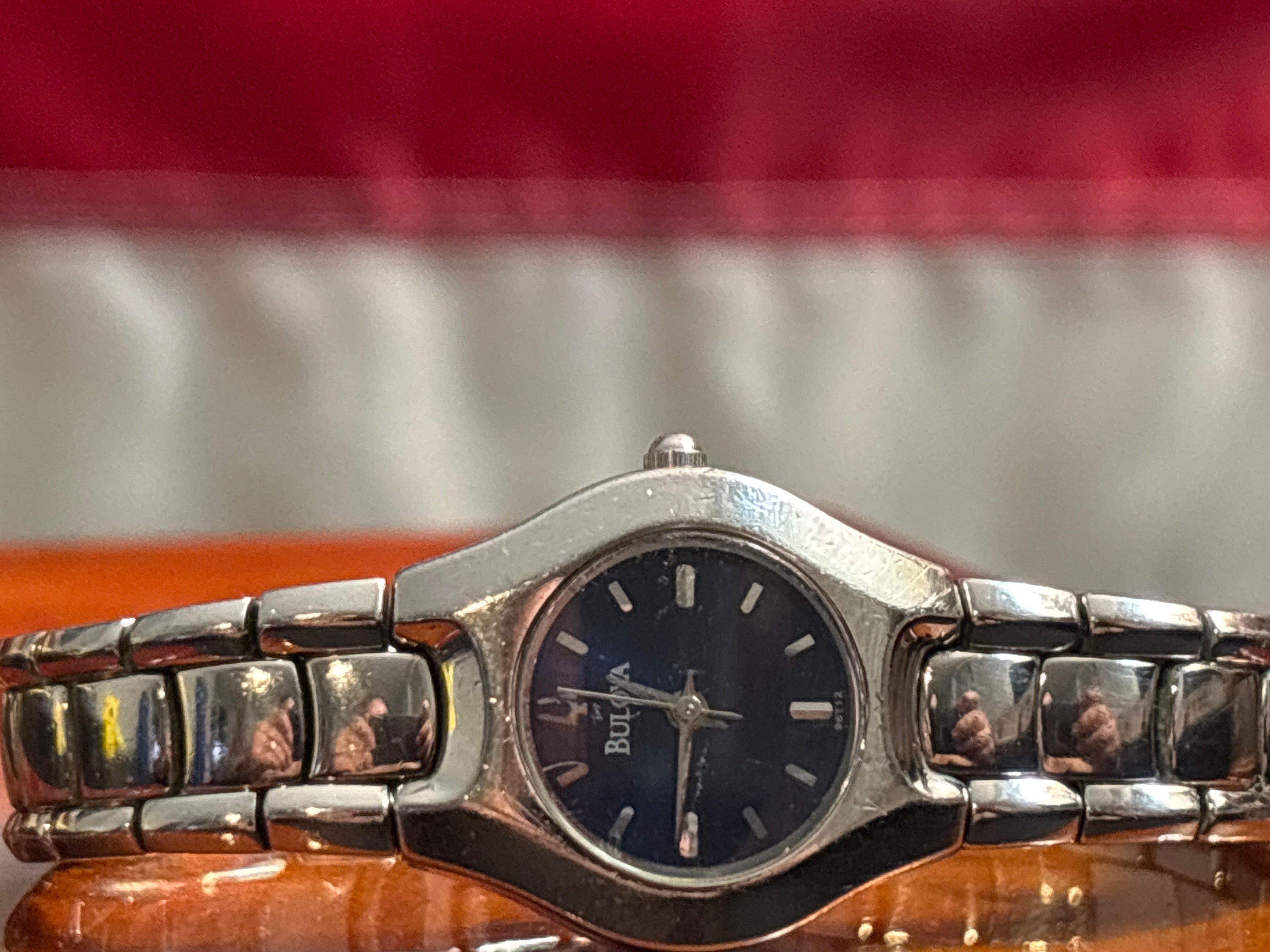 Bulova ladies quartz time piece on stainless steel bracelet