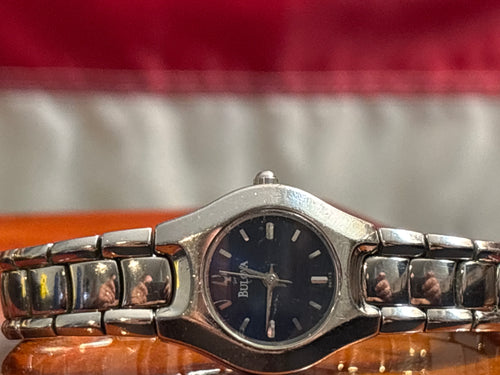 Bulova ladies quartz time piece on stainless steel bracelet