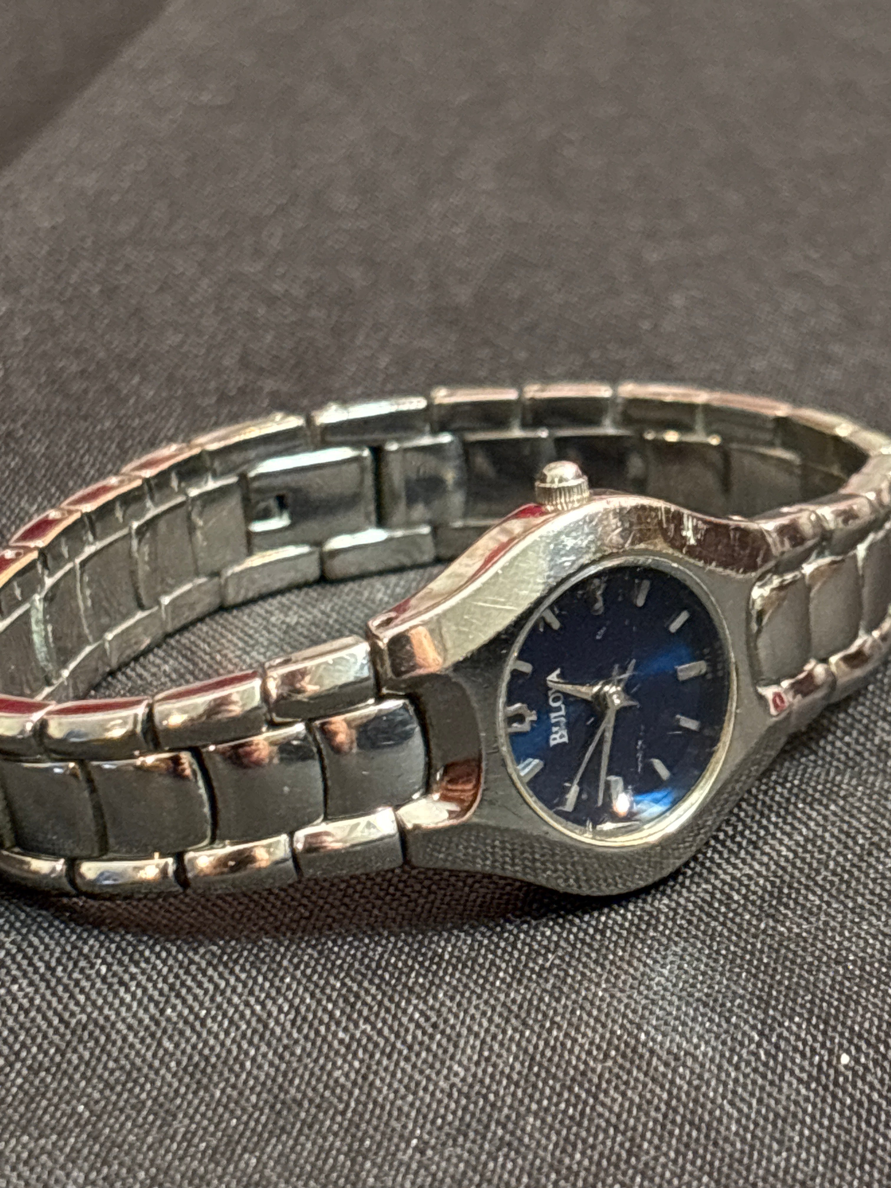 Bulova ladies quartz time piece on stainless steel bracelet