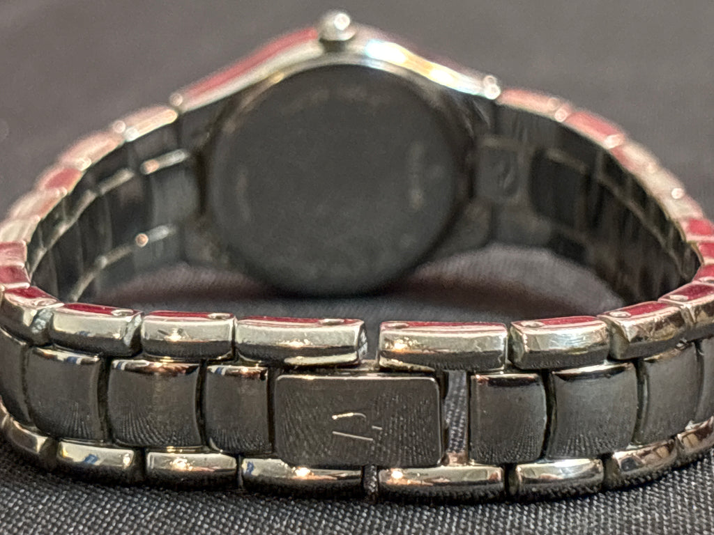Bulova ladies quartz time piece on stainless steel bracelet
