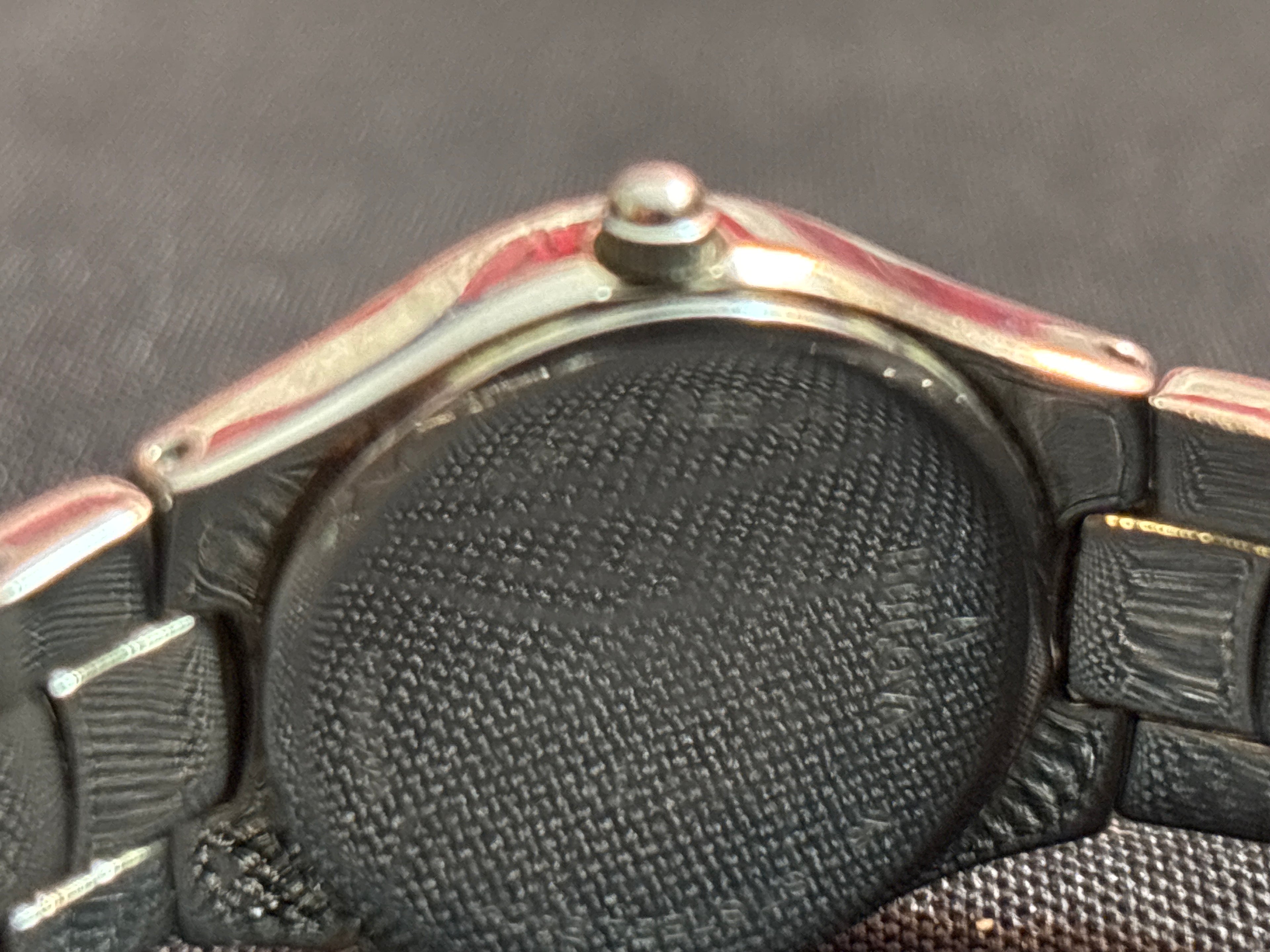 Bulova ladies quartz time piece on stainless steel bracelet