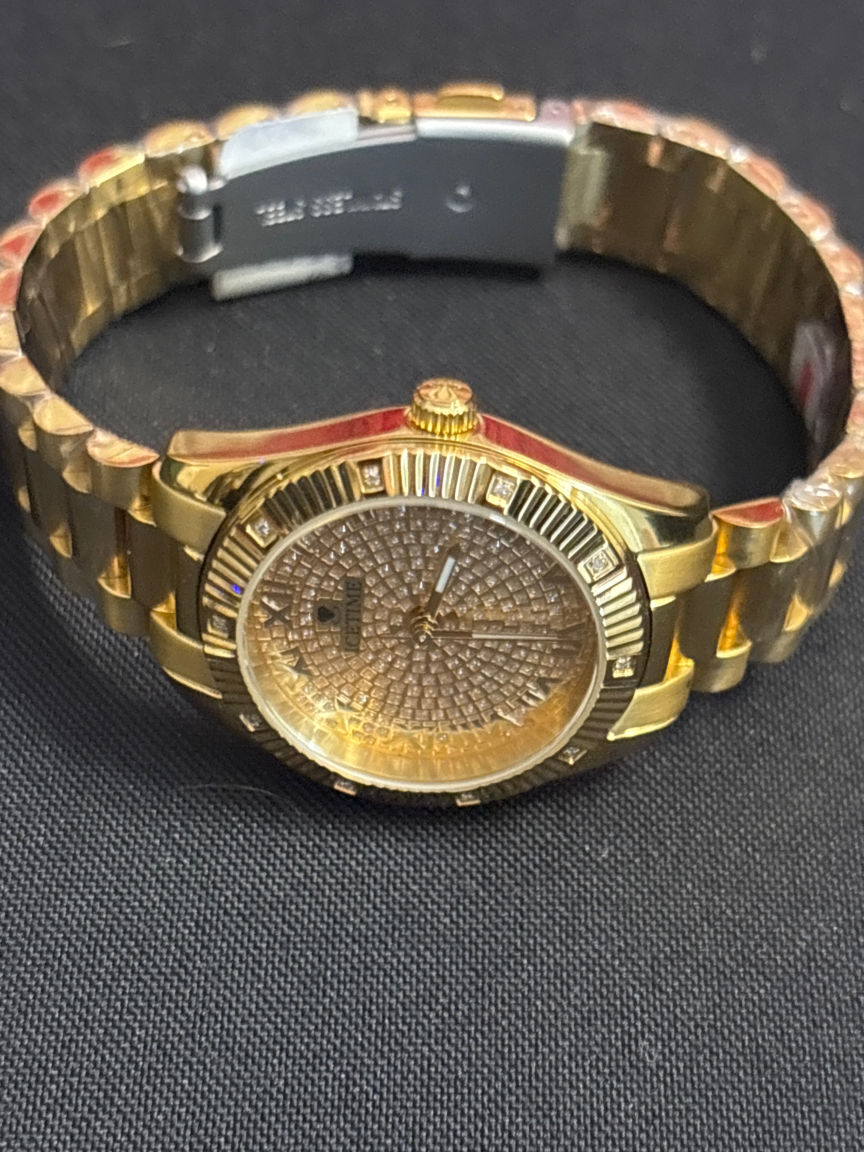 Icetime his/hers both full sets .10carat diamonds in each time piece.