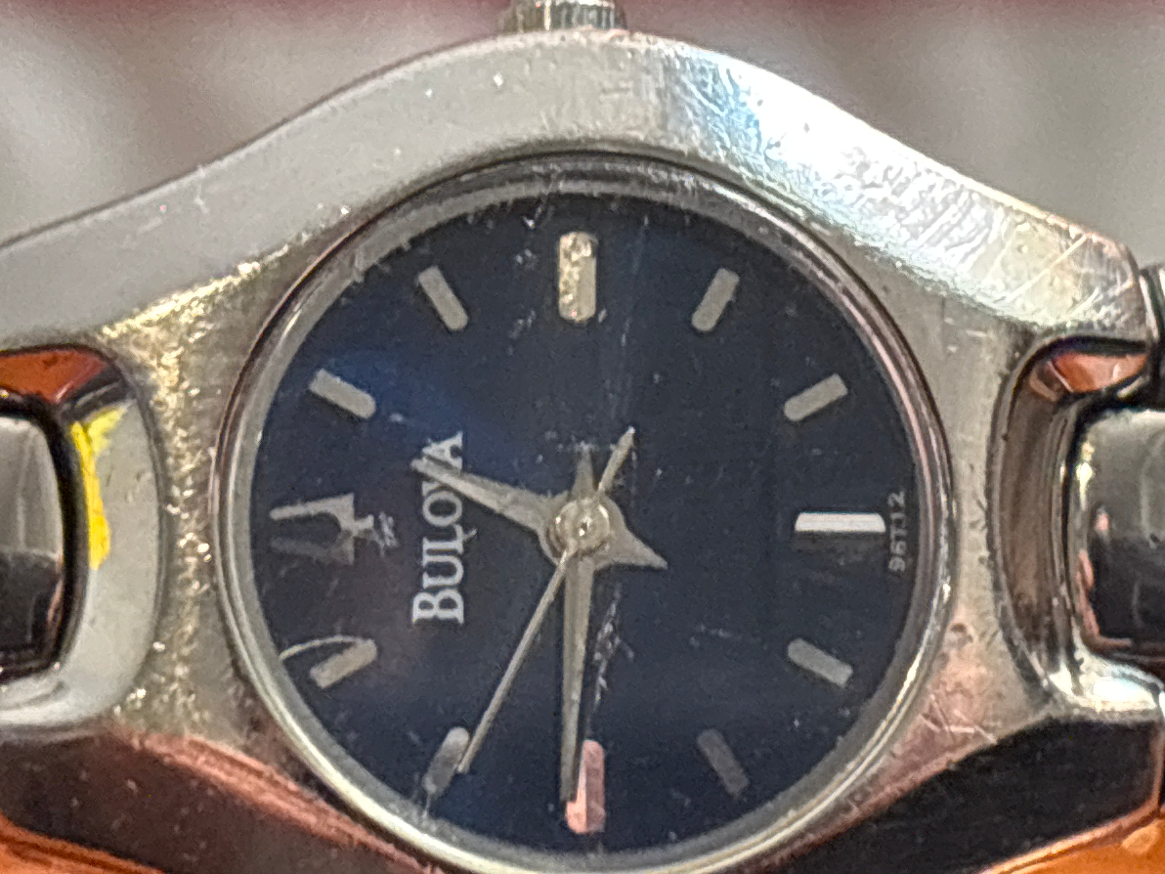 Bulova ladies quartz time piece on stainless steel bracelet