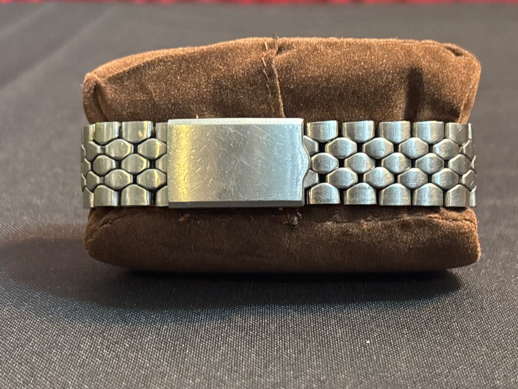 Omega Seamaster Deville date SS case on beads of rice bracelet.